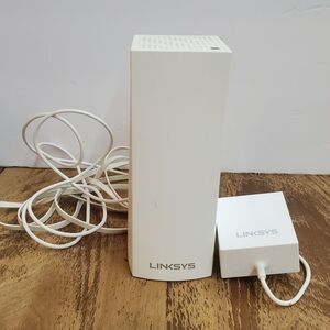White Linksys WHW03 V2 Velop Tri-Band Mesh WiFi System.